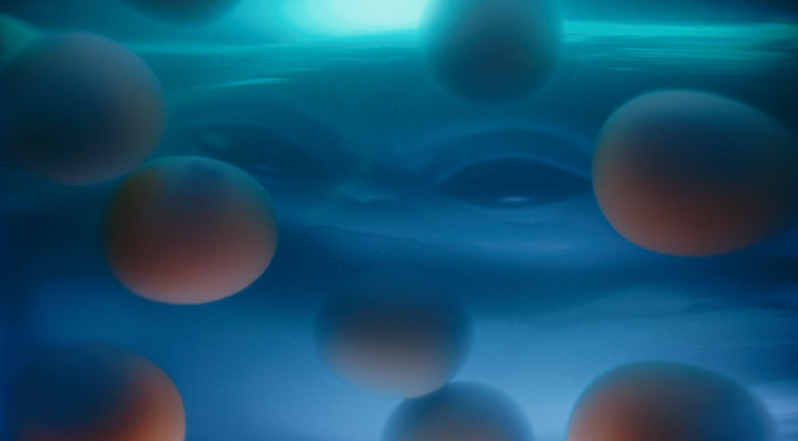 Okay, let's analyze the image based on the requested theoretical frameworks. **Visual Description** The image presents an abstract underwater scene with a dominant cool blue color palette. The composition is character...