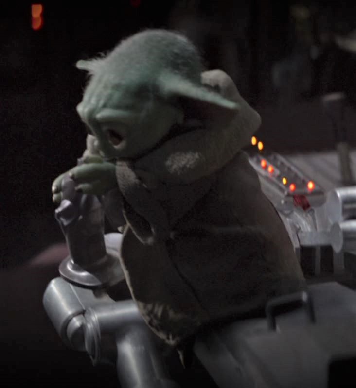 Okay, let's analyze the image of Grogu (Baby Yoda) through the lenses you've requested. Given the image’s limited context, certain analyses will be more speculative, but I'll provide as thorough a response as possible...