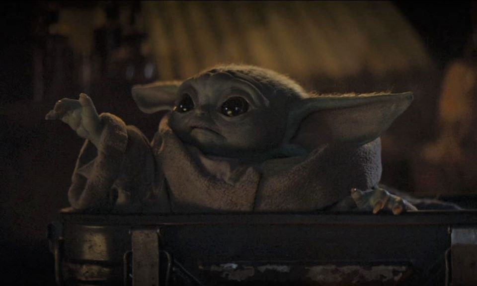Okay, let's analyze the image of "Baby Yoda" (Grogu) from *The Mandalorian* through the lenses you requested. Given the image and subject, some lenses will be more fruitful than others. **Visual Description** The imag...