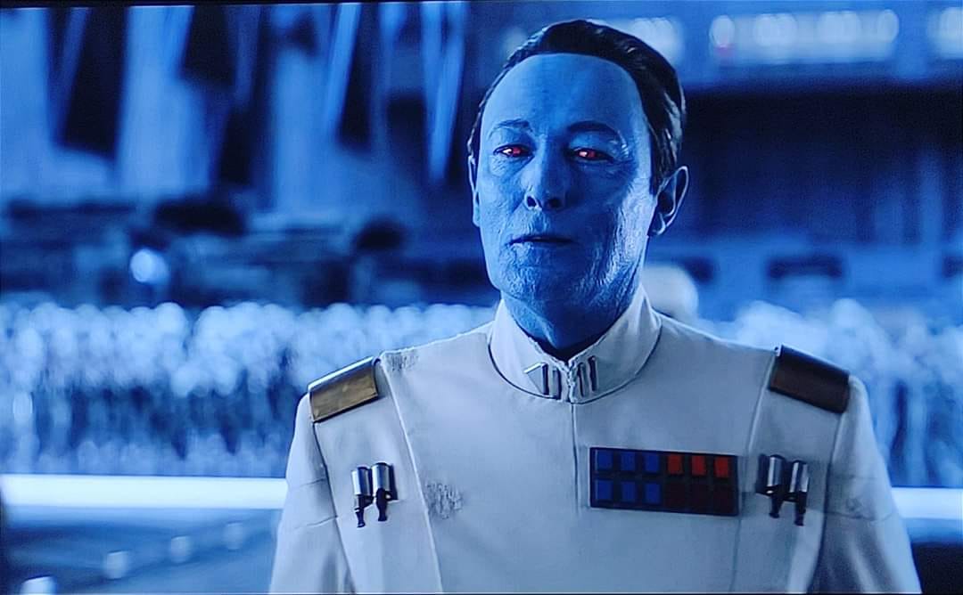 Okay, let's analyze the image of Grand Moff Tarkin from *Star Wars: Rogue One* through the lenses you requested. Keep in mind that some of these theories won’t apply as strongly as others, and interpretations can be s...