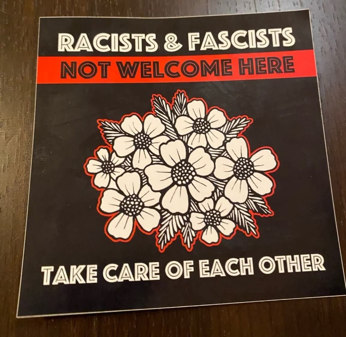This graphic is a controversial sticker designed for social media that ironically takes the opposite stance from the popular "pro-flower" stickers found online. At the top, the text declares "RACISTS & FASCISTS NOT WE...