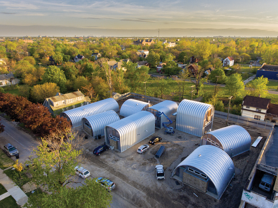 Okay, let's break down this aerial photograph through the requested critical lenses. Note that some sections will be brief or nonexistent if a lens doesn't strongly apply. **1. Visual Description** The image is an aer...