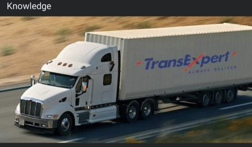 Here's an analysis of the image based on your requested theoretical frameworks. Note that some frameworks are more applicable than others. **Visual Description** The image depicts a large, white semi-trailer truck tra...