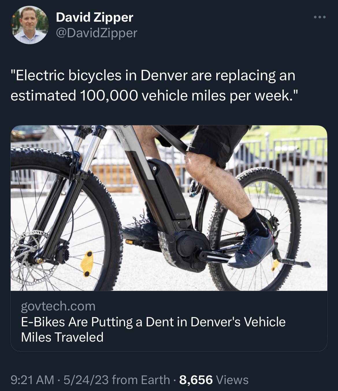 Okay, let's break down this Twitter post through the lens of several theoretical frameworks. ## Visual Description The image shows a close-up shot of the front and side of an electric bicycle (e-bike) in motion. The f...