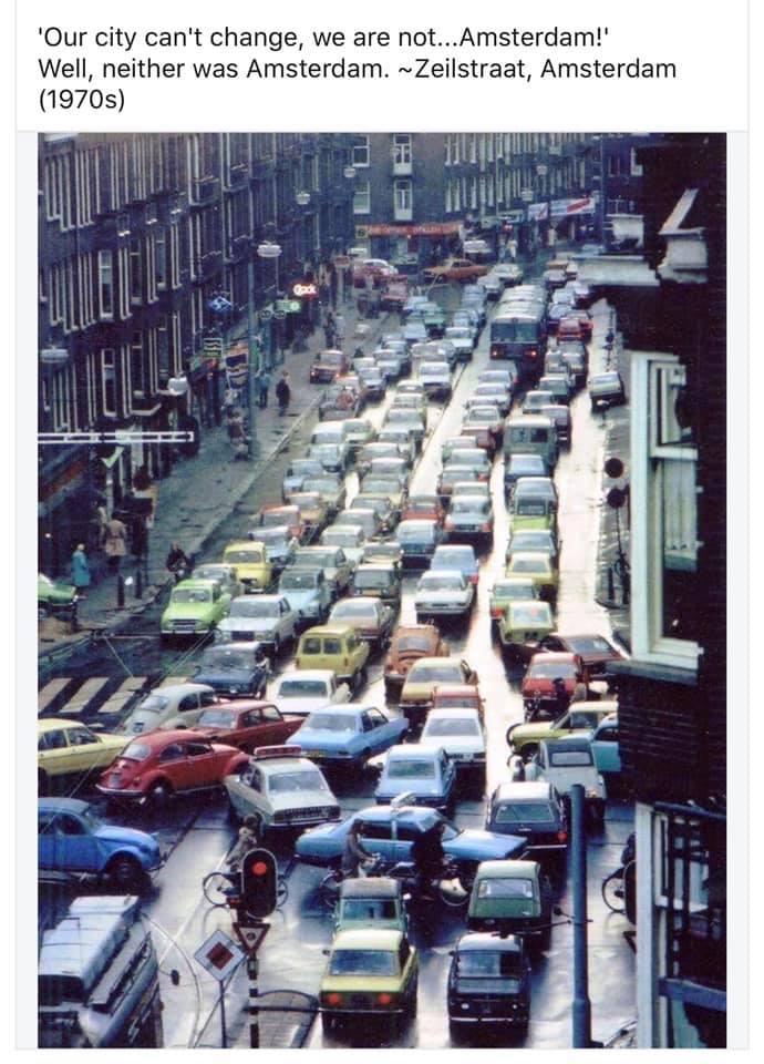 Okay, here's an analysis of the photograph, broken down into sections addressing the requested theoretical frameworks. I'll indicate where a framework *doesn't* strongly apply to avoid unnecessary stretching of the an...